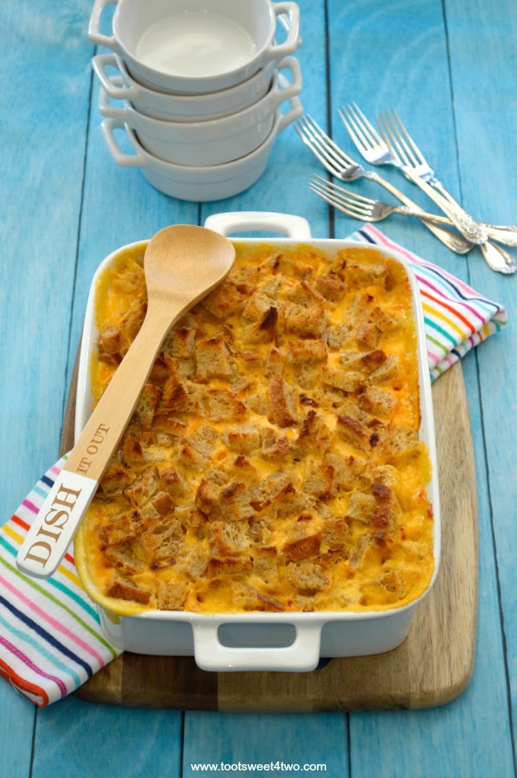 Baked Mac & Cheese with a Crunchy Sourdough Topping in a casserole dish, ready to serve.