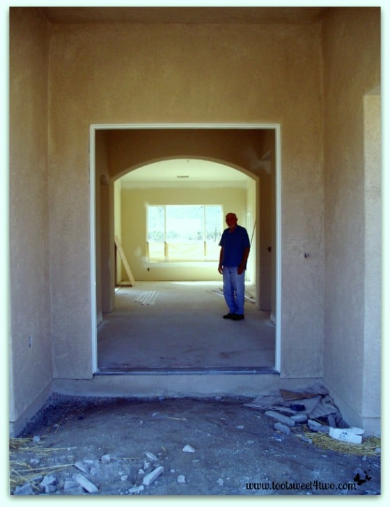 My father (the fabulous artist!) in the front entrance of our new house.