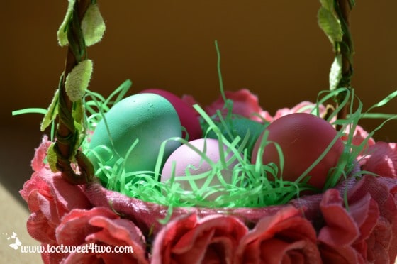 Easter eggs in rose basket