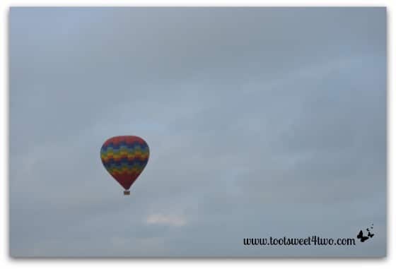 Rainbow Hot Air Balloon high in the sky