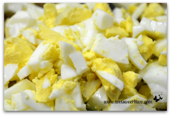 Chopped hard-boiled eggs for Tri-colored Roasted Potato Salad