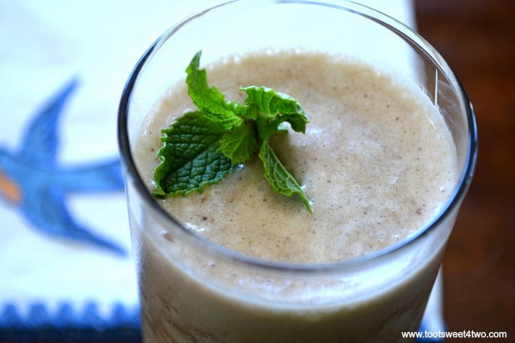 Coffee Banana Protein Smoothie - an easy, delicious and healthy way to start your morning. Coffee and whey protein powder supply the energy and a serving of fruit, a frozen banana, makes it the perfect blender breakfast. Whether you are watching calories for weight loss or just need a quick breakfast with extra protein, this recipe delivers. | www.tootsweet4two.com