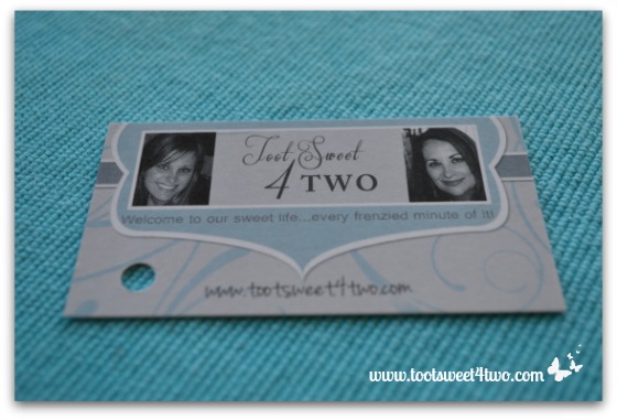 Easy Party Favors Featuring You - business card with hole punched in it