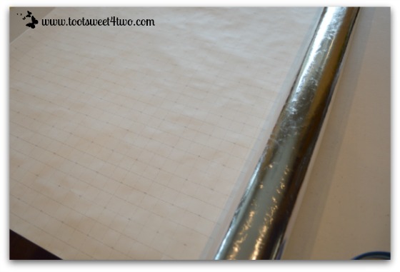Silver wrapping paper with cutting grid