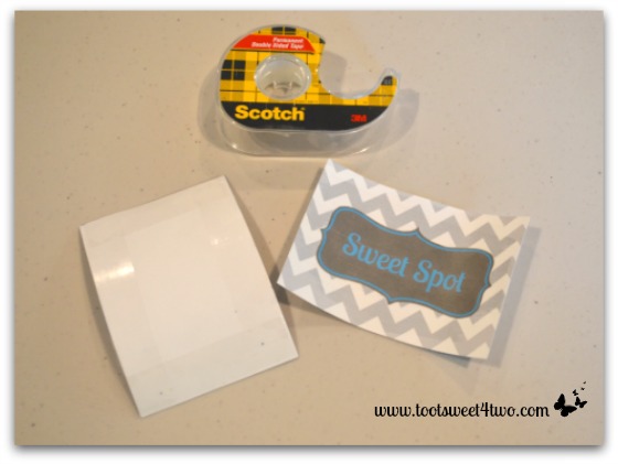 Use double-stick tape to tape both sides together