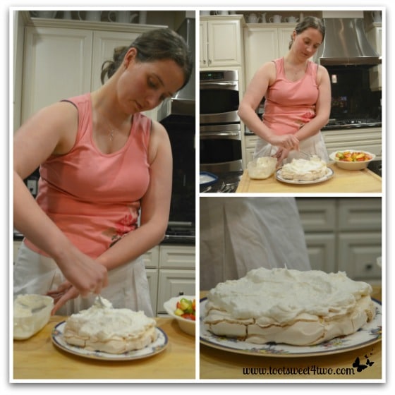 Vanessa adding whipped cream to meringue for Vanessa's Pavlova