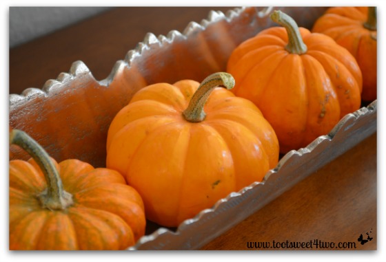 Another picture of mini pumpkins in the silver bowl