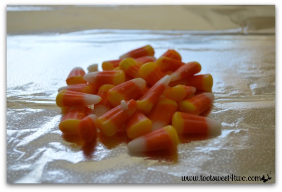 Place candy corn in center of foil for Cute and Easy Halloween Candy Packets