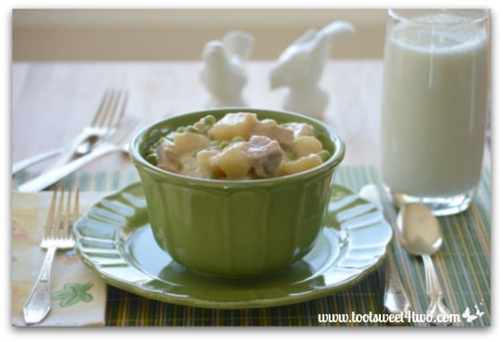 Creamed Potatoes with Ham and Petite Peas and a glass of milk