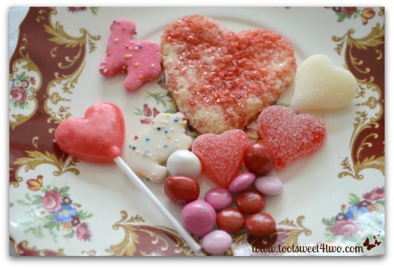 Valentine candy and cookies on an English dessert plate
