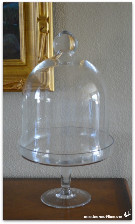 The empty glass cloche by my front door - 42 Things in Your Foyer