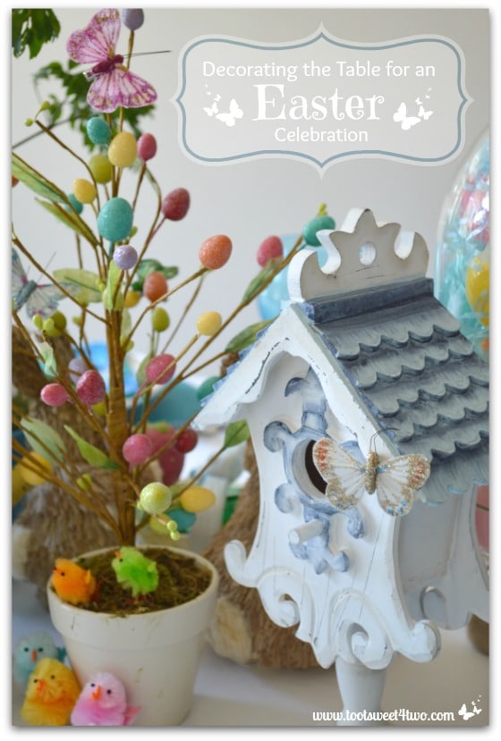 White birdhouse and egg tree - Decorating the Table for an Easter Celebration