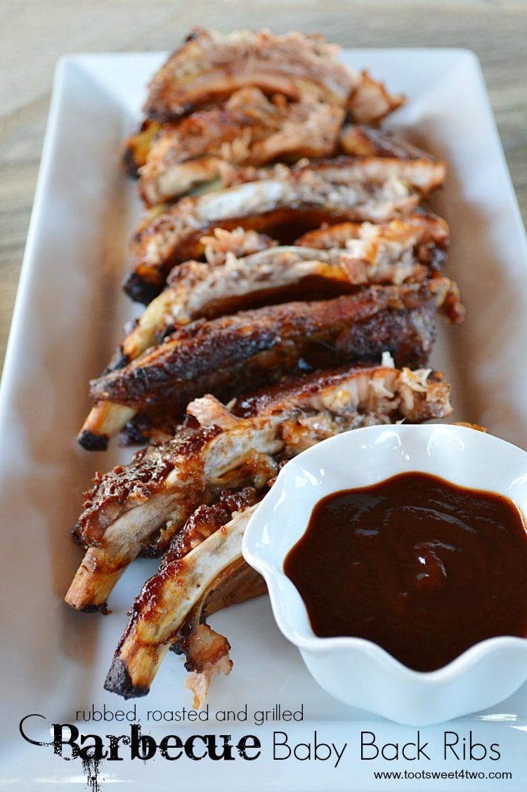 The trifecta of cooking the best baby back ribs, with this recipe you rub, roast, grill on the barbecue, pork ribs to perfection! Fall-off-the-bone deliciousness, this BBQ ribs recipe delivers all the sticky goodness of ribs on the grill, but less time standing over the hot grill and babysitting them. Roast the ribs in the oven first and finish the ribs on the grill. | www.tootsweet4two.com