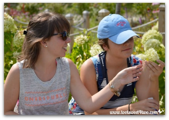 Erin and Molly looking at flowers at Chautauqua Institution