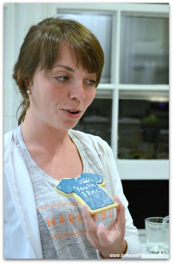 Erin with finished T-shirt cookie - Erin's Iced Sugar Cookie Cutouts