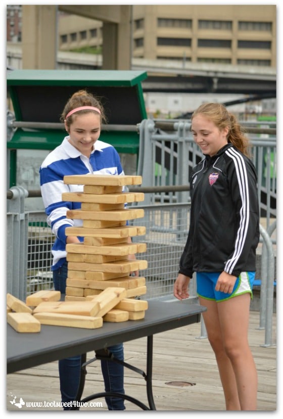 Molly and Bizzy at Canalside playing board game