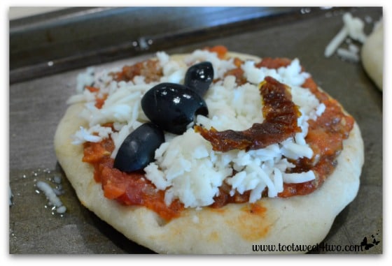 Assembled Bat Under a Blood Red Moon Pizza close-up - Fright Night Mini Pizzas