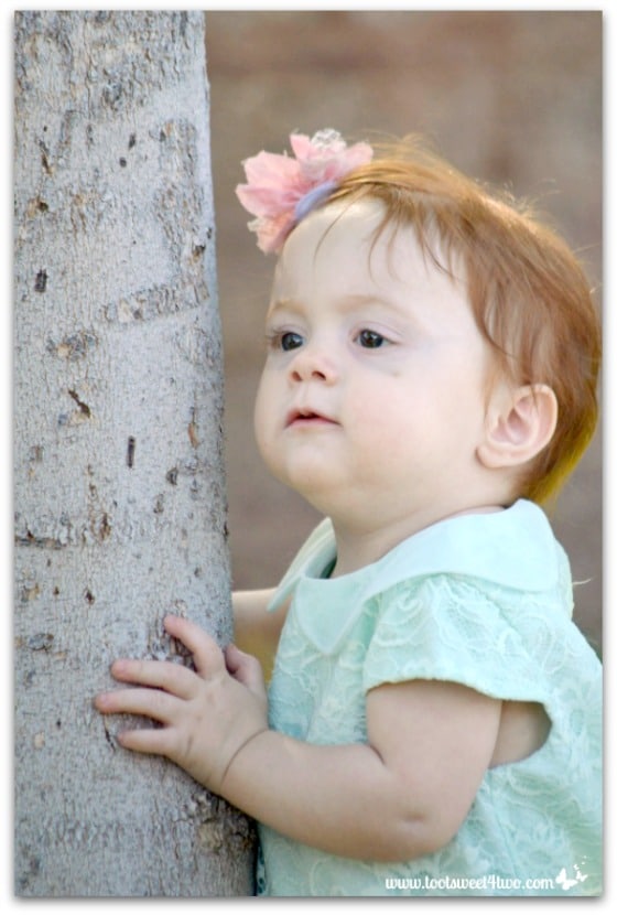 Princess Sweet Cheeks holding tree