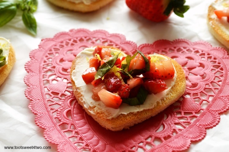 Sweetheart Strawberry Crostini is an easy and delicious appetizer that can be made in minutes. Make Valentine's Day special, just with a few key ingredients! | www.tootsweet4two.com