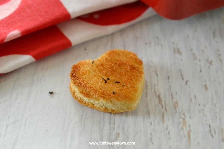 Mini heart-shaped crouton for strawberry salad on Valentine's Day.