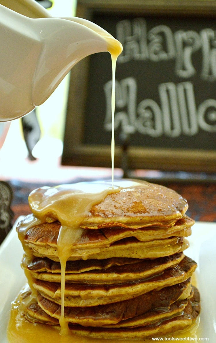 Pumpkin Pancakes with pouring Maple Butter Glaze