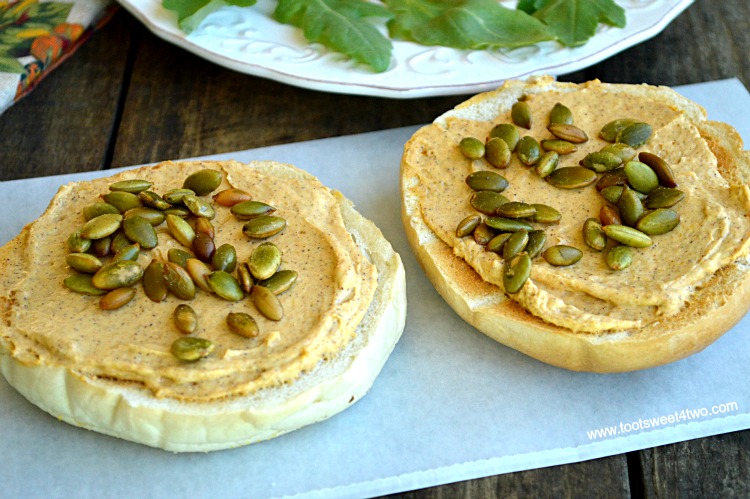 Harvest Pumpkin Cream Cheese Spread on Toasted Bagels with Pepitas