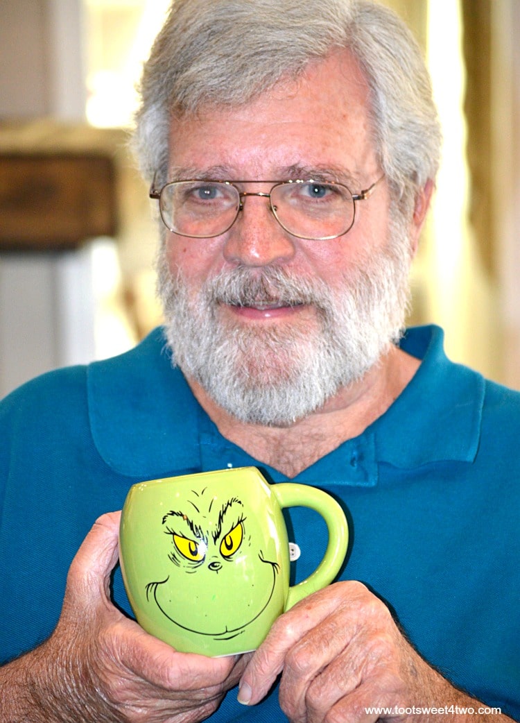 Charlie and his Grinch coffee cup