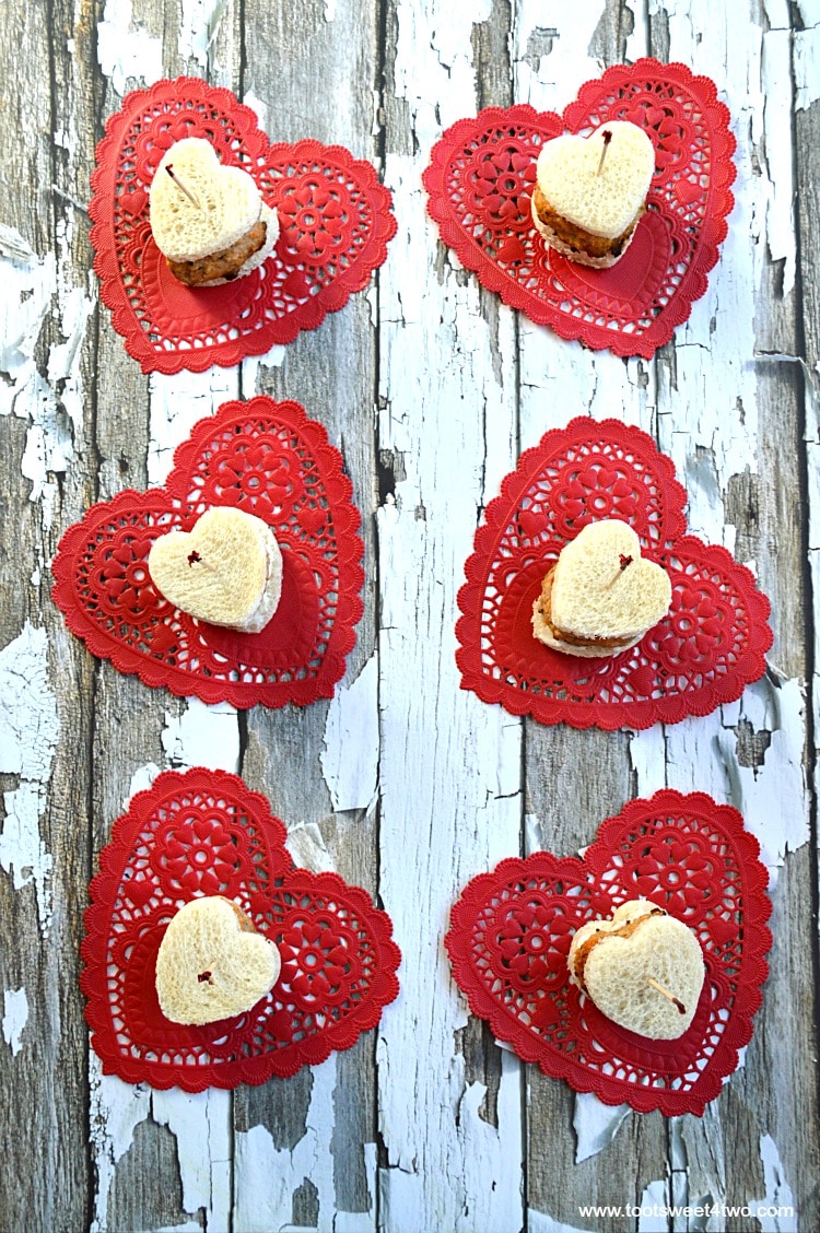 Mini Sweetheart Meatloaf Sandwiches on red heart paper doilies