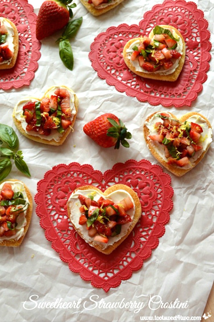 Sweetheart Strawberry Crostini on red heart-shaped paper doilies