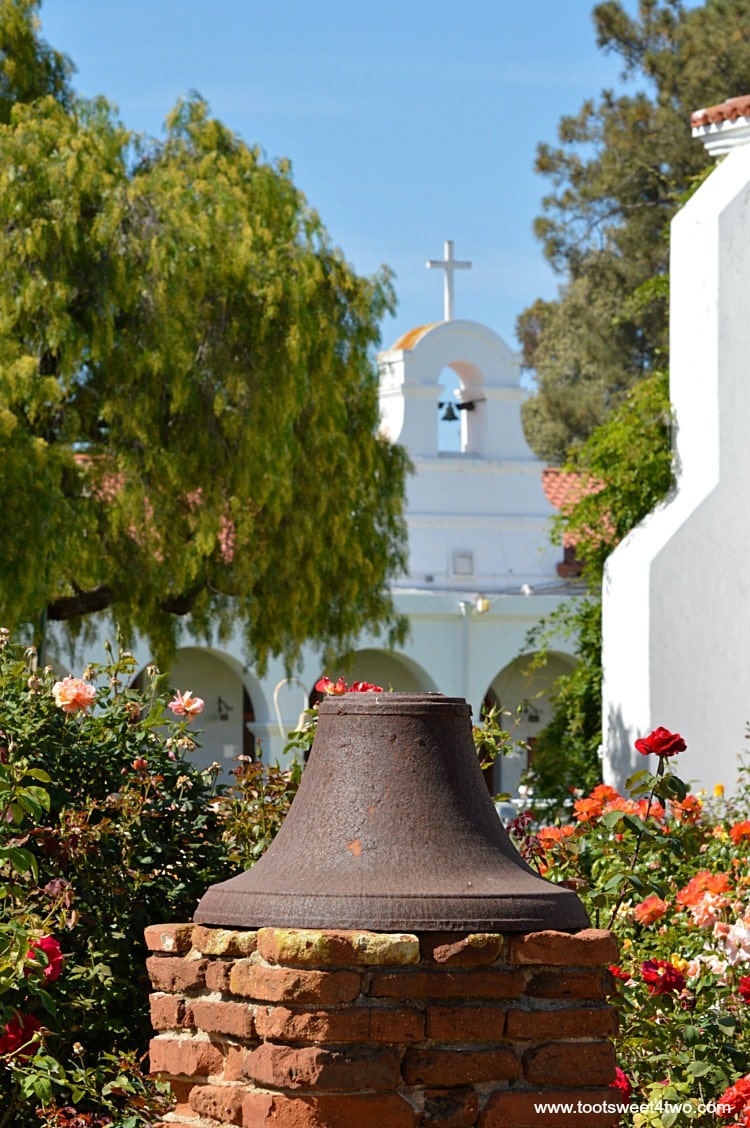 Iron bell in the gardens at Mission San Luis Rey Welcome Center