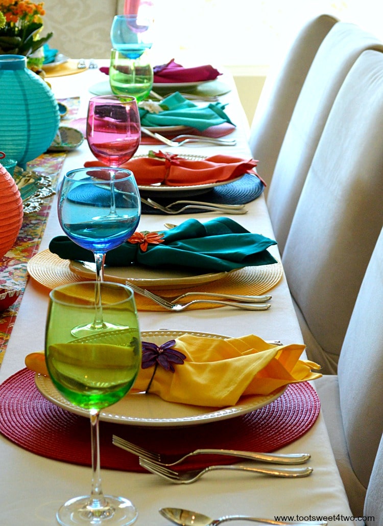 Place settings in a row for Decorating the Table for a Cinco de Mayo Celebration