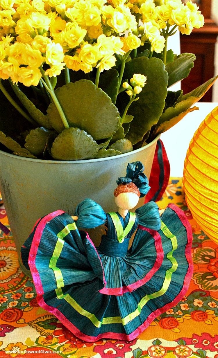 Teal corn husk doll for Decorating the Table for a Cinco de Mayo Celebration