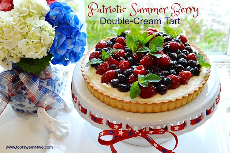 An easy, no-bake dessert, Patriotic Summer Berry Double-Cream Tart is a winning recipe to celebrate 4th of July or any other red, white and blue holiday. A flaky, store-bought sweet pastry tart shell covered with a sweet double-cream filling and topped with fresh fruit, makes a beautiful and delicious treat for Independence Day! | www.tootsweet4two.com