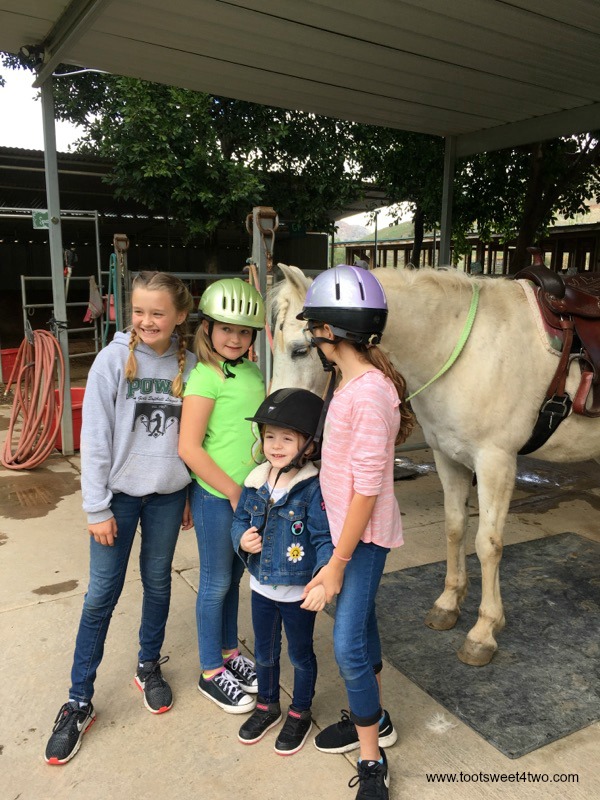 Payton, Parker, Belle and Hayden pose with Dandy at The Ranch at Bandy Canyon