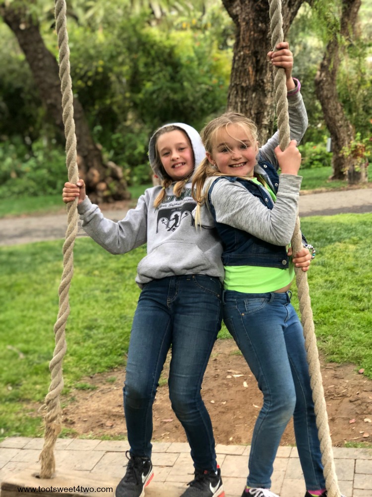 Payton and Parker on a swing at The Ranch at Bandy Canyon