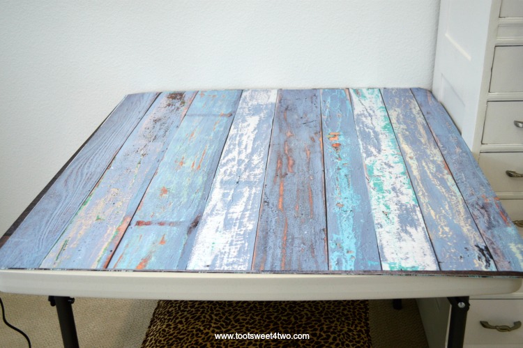 Faux Blue Wood Photography Backdrop on folding table