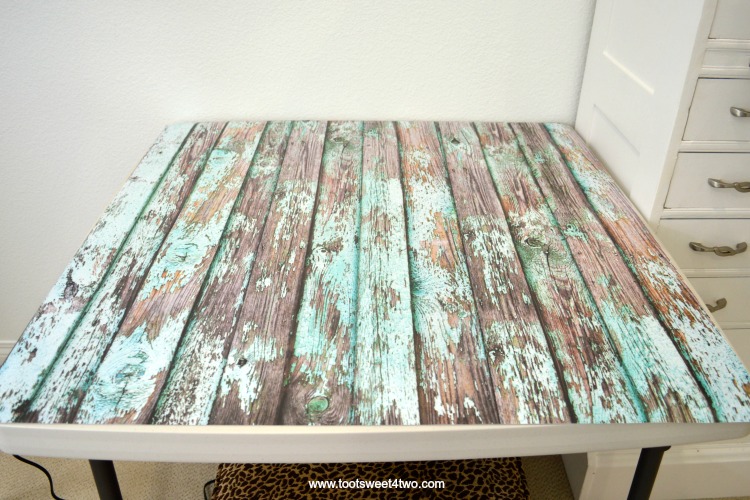Faux Peeling Mint Green Wood Backdrop on folding table