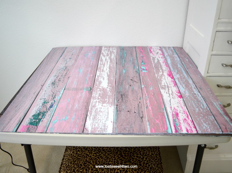 Faux Pink Wood Photography Backdrop on folding table