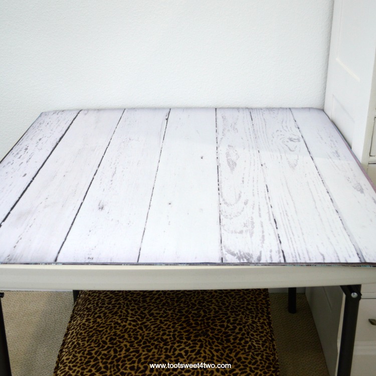 Faux White Wood photography backdrop on folding table