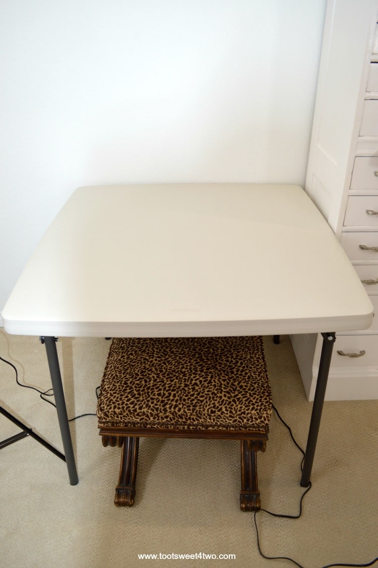 Folding Table against white wall in food photography home studio