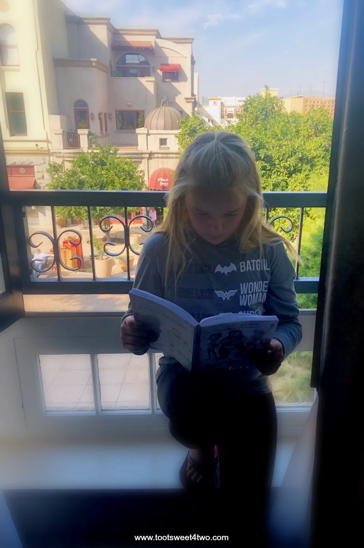 Princess Sweetie Pie reading bedtime stories on balcony